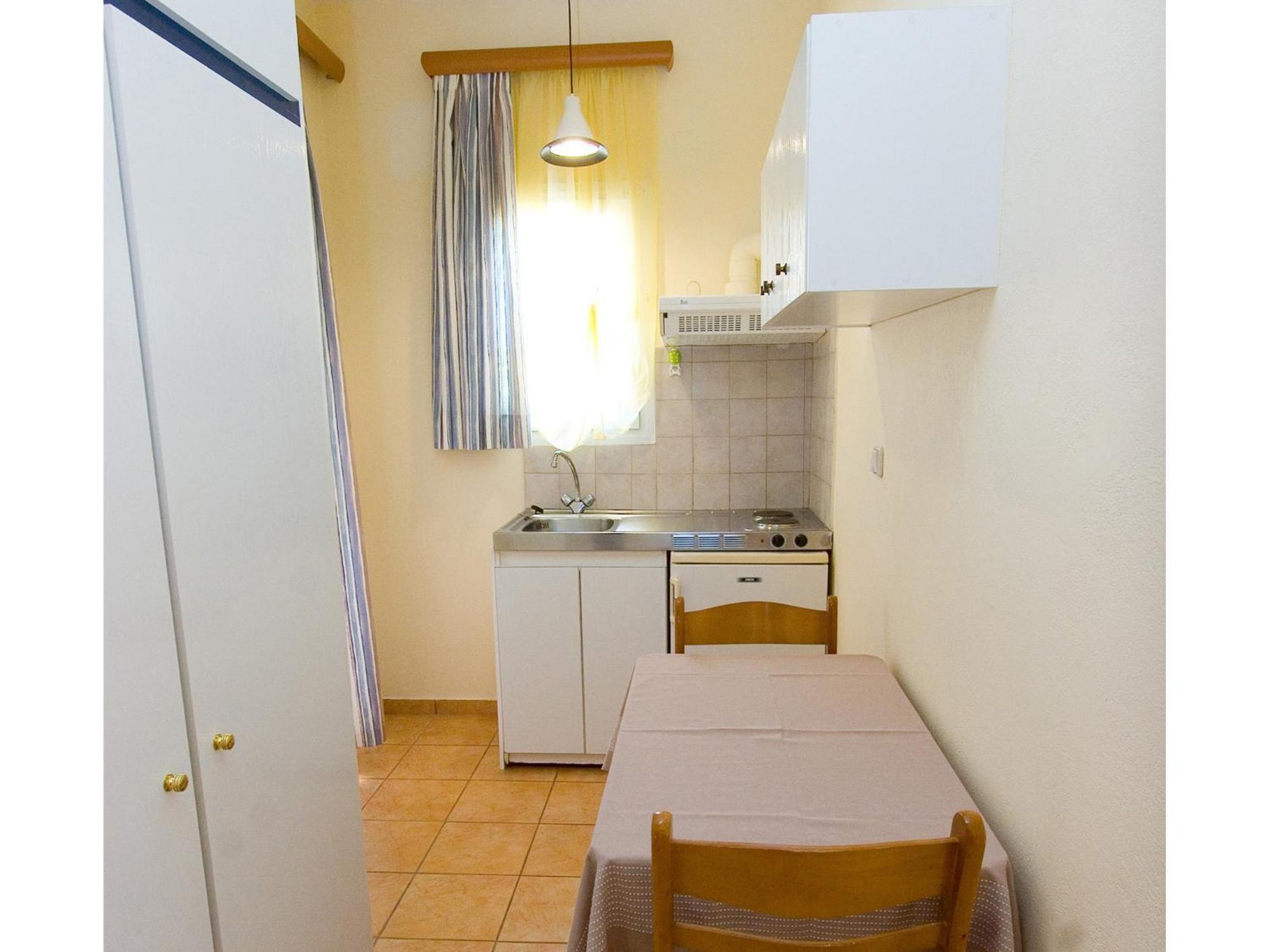G. Kiapekou Aparthotel Лутра Едипсу Стая снимка